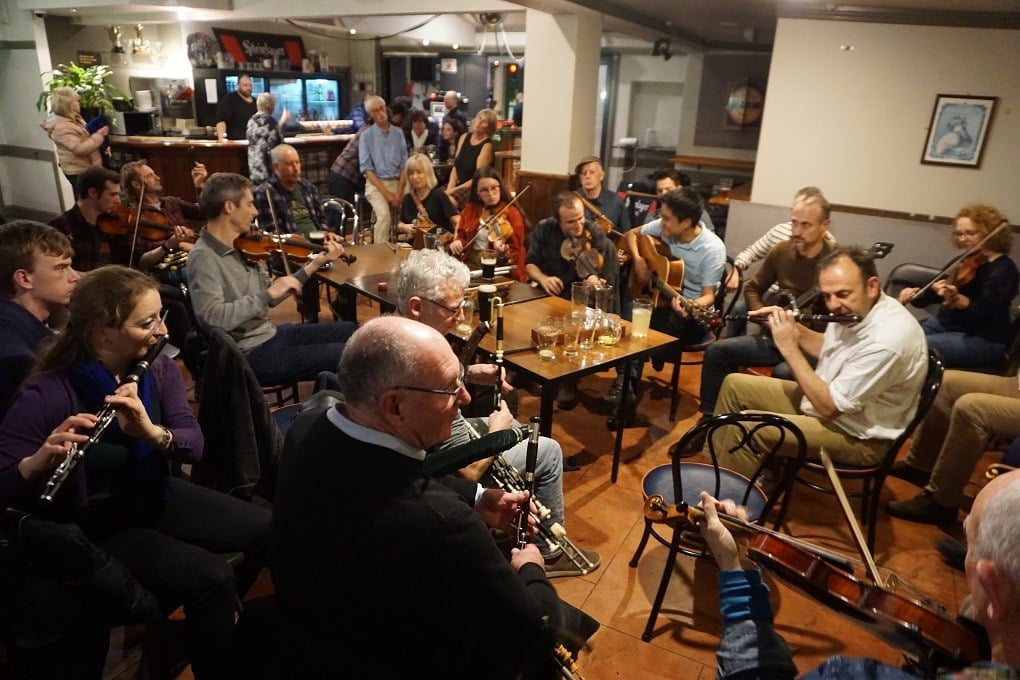 musicians at a traditional Irish music session in a bar in Nelson