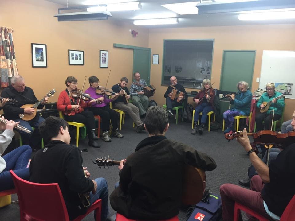 traditional Irish fiddle class with students learning